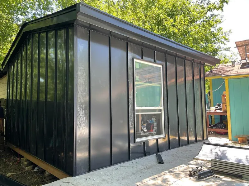 Black standing seam metal wall panels for Metal Roof Installation in Wilmer